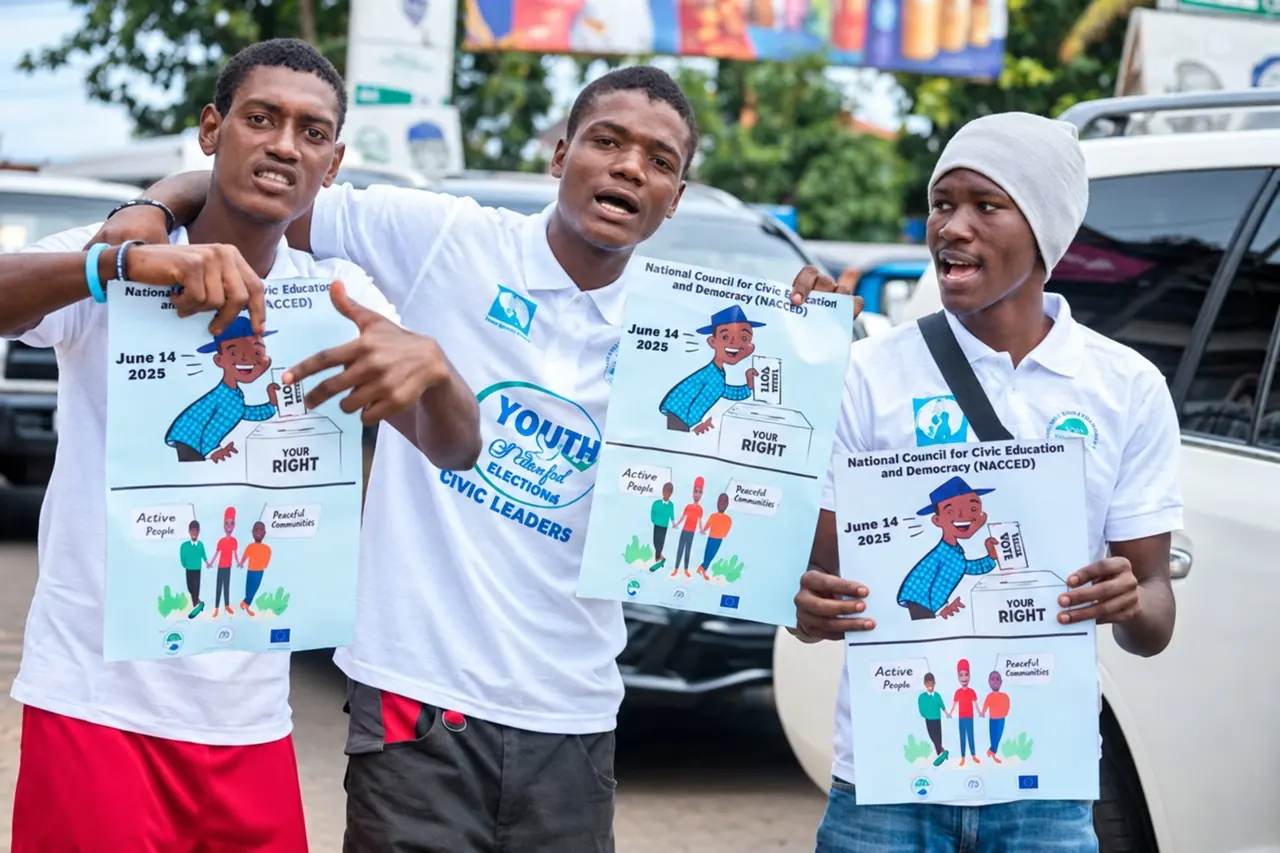 Young people holding civic education posters